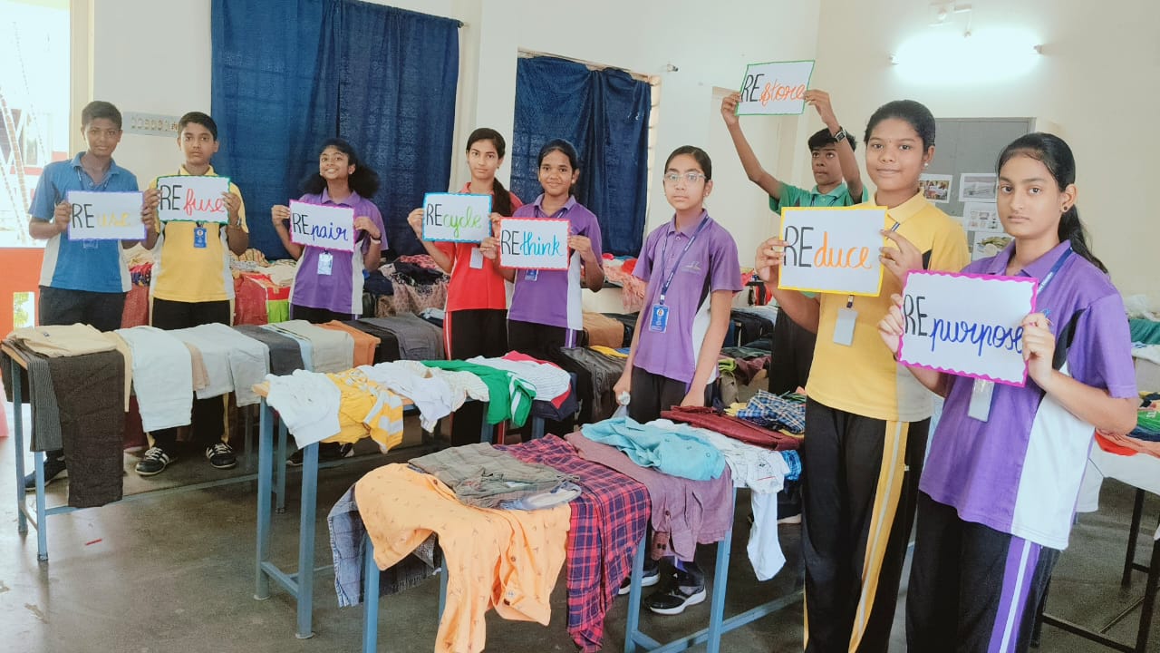 Students celebrating creative and sustainable fashion.